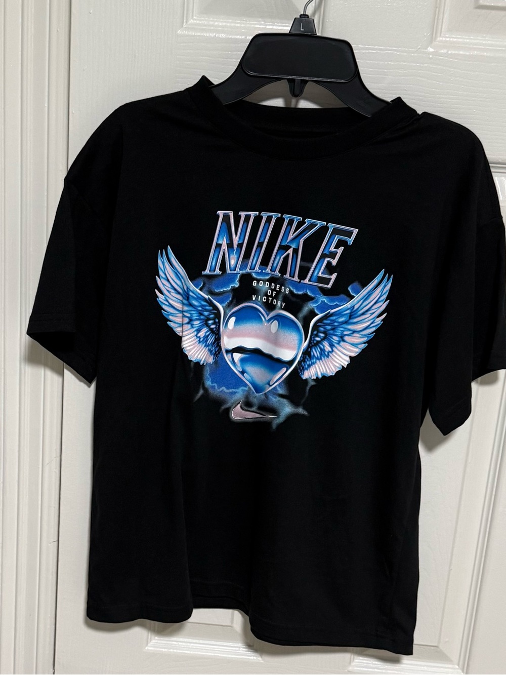 Nike Black Tee with Blue Winged Heart Graphic